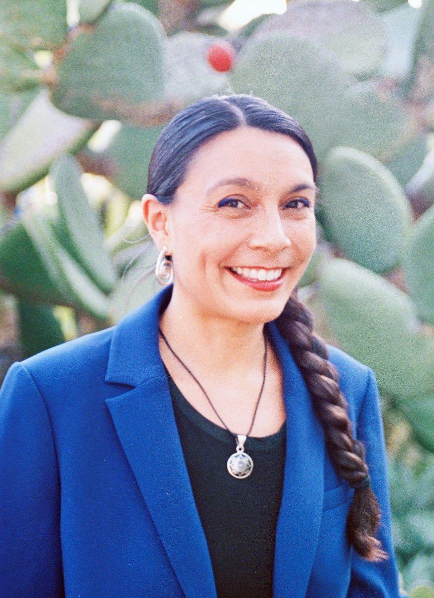 Incoming CSRC Director stands in front of cacti