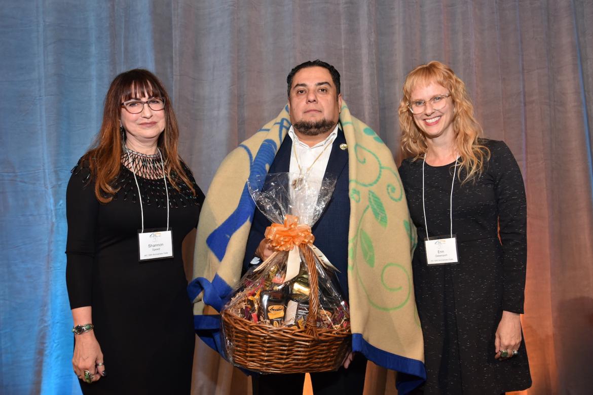 (L,R) AISC Director Shannon Speed, IAC Community Impact Awardee Fernandeño Tatavium Band of Mission Indians Tribal President Rudy J. Ortega Jr., and AISC Associate Director Erin Debenport. 